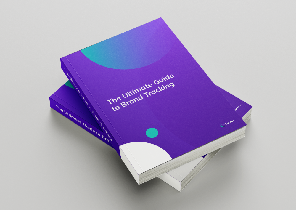 Purple books stacked on each other with title of The Ultimate Guide to Brand Tracking