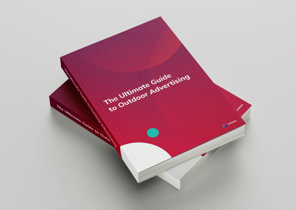 two red books stacked titled The Ultimate Guide to Outdoor Advertising