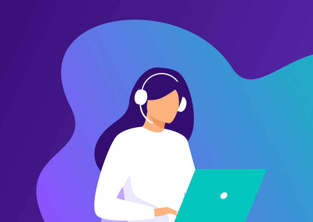 Woman working on a laptop with headset on