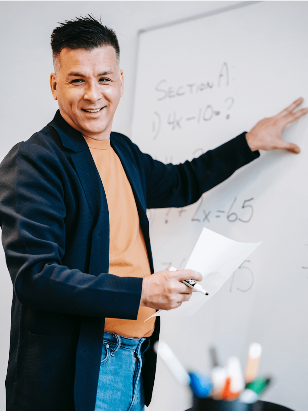 Man showing on a whiteboard