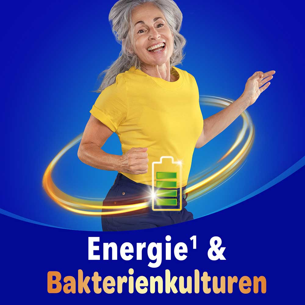 Lächelnde ältere Frau im gelben Shirt mit einem Energie-Icon und dem Text „Energie & Bakterienkulturen" auf blauem Hintergrund