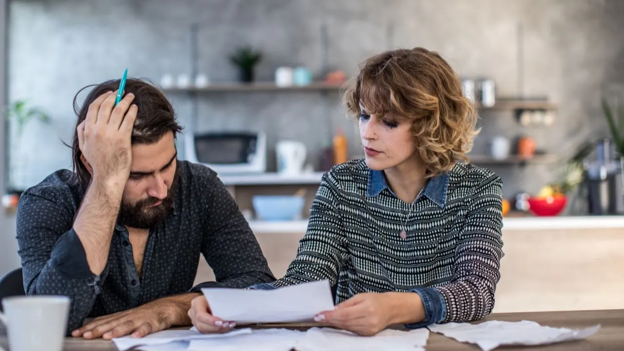 Married couple having financial problems at home.