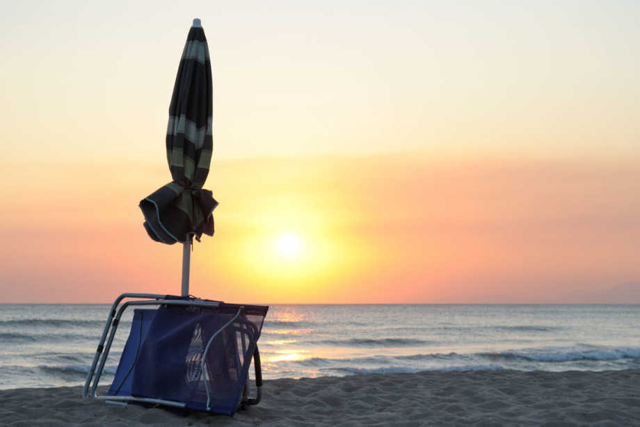 Sunset with Beach Umbrella and Chair