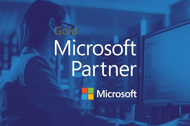 A woman looking at a screen of code with Microsoft gold patner overlay on the image