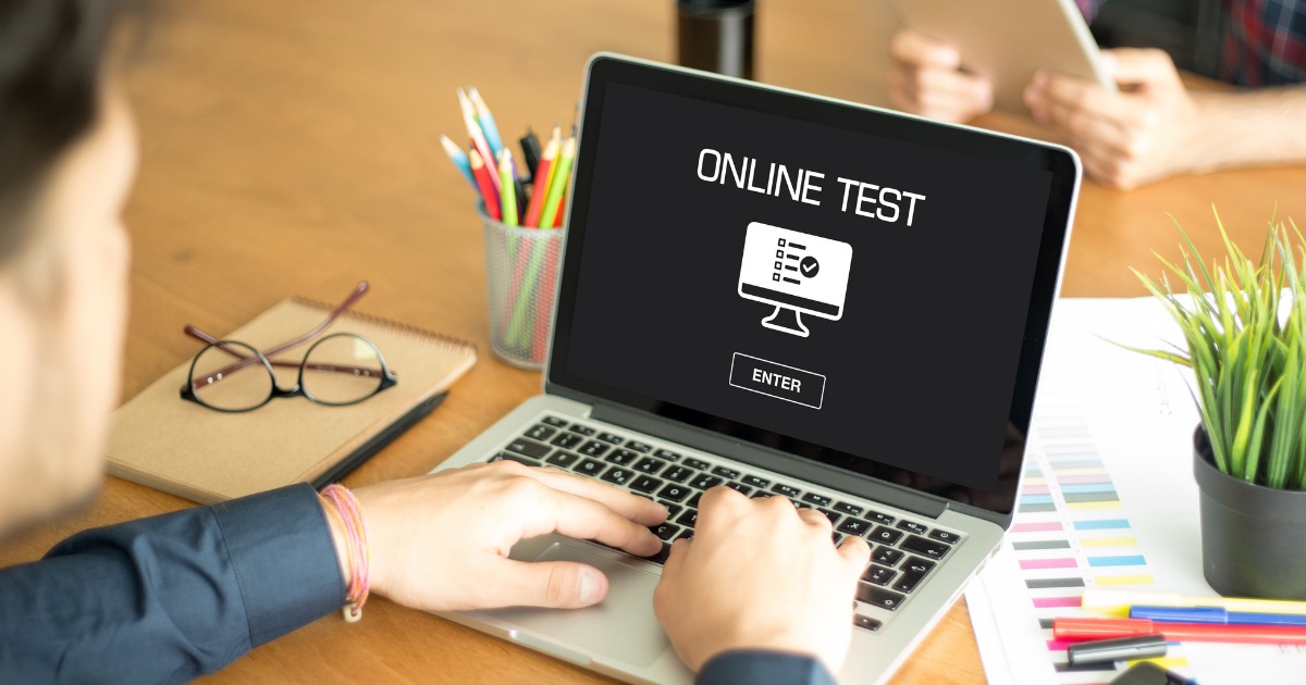 Man taking test online - Microsoft certification exam