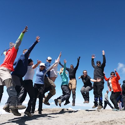 Lucy group jumping on Mount Kilimanjaro