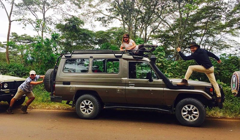 Friends on safari car having fun