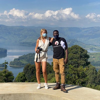 Client wears coronavirus in Uganda overlooking lake Bunyonyi