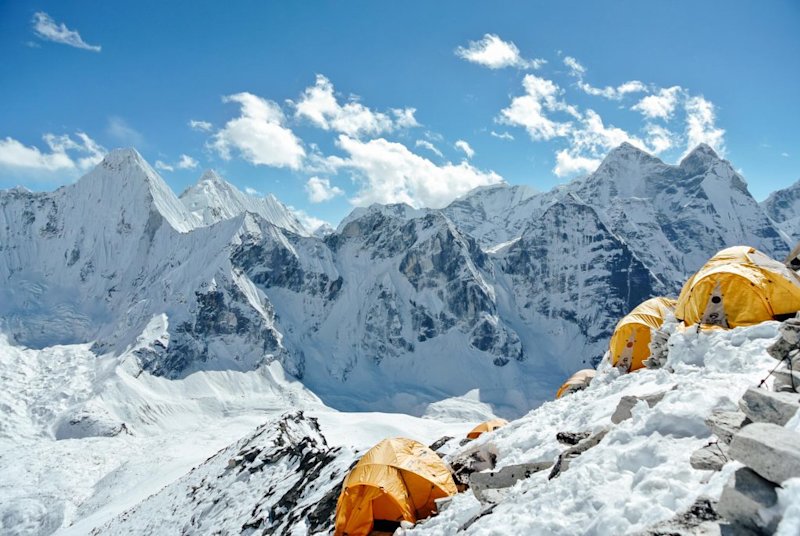 Tents in the snow covered Annapurna mountain range in Nepal