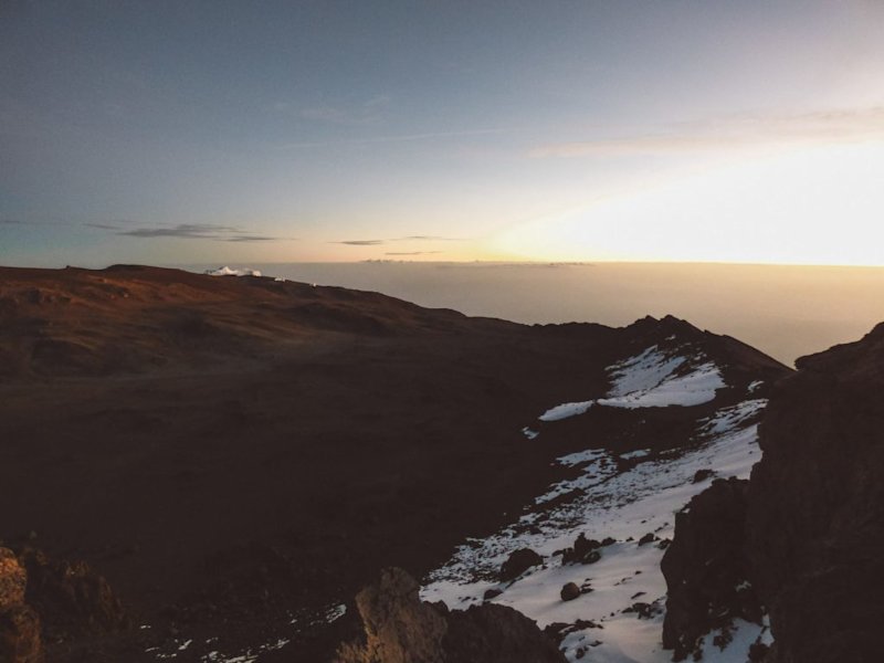 Snow on summit of Kilimanjaro at sunrise, Kilimanjaro safety