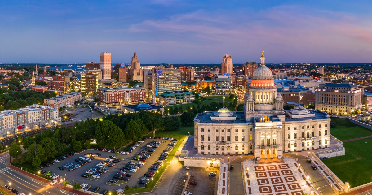 Aerial panorama of Providence skyline and Rhode Island capitol building at dusk