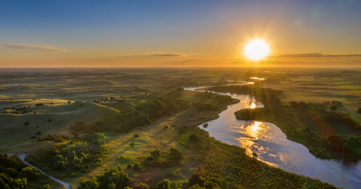 A sunrise over the Dismal River in Nebraska | Swyft Filings