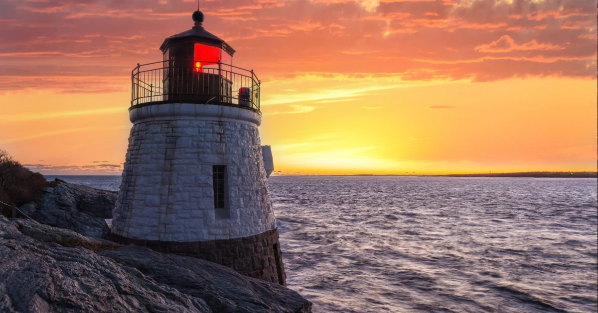 Lighthouse at sunset off the coast of Rhode Island