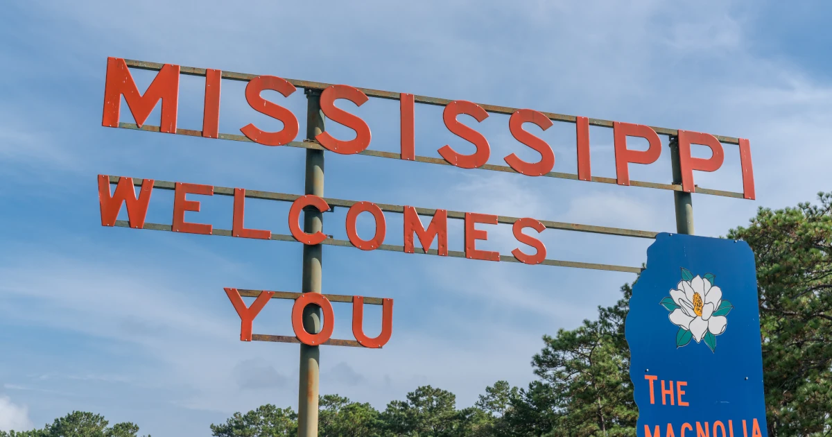 Sign that says, "Mississippi Welcomes You!" | Swyft Filings