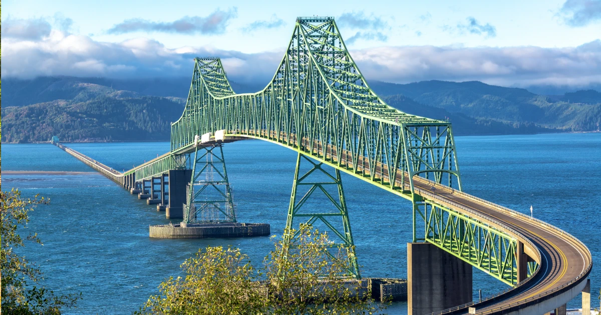 Bridge heading into Portland, Oregon with mountains in the back