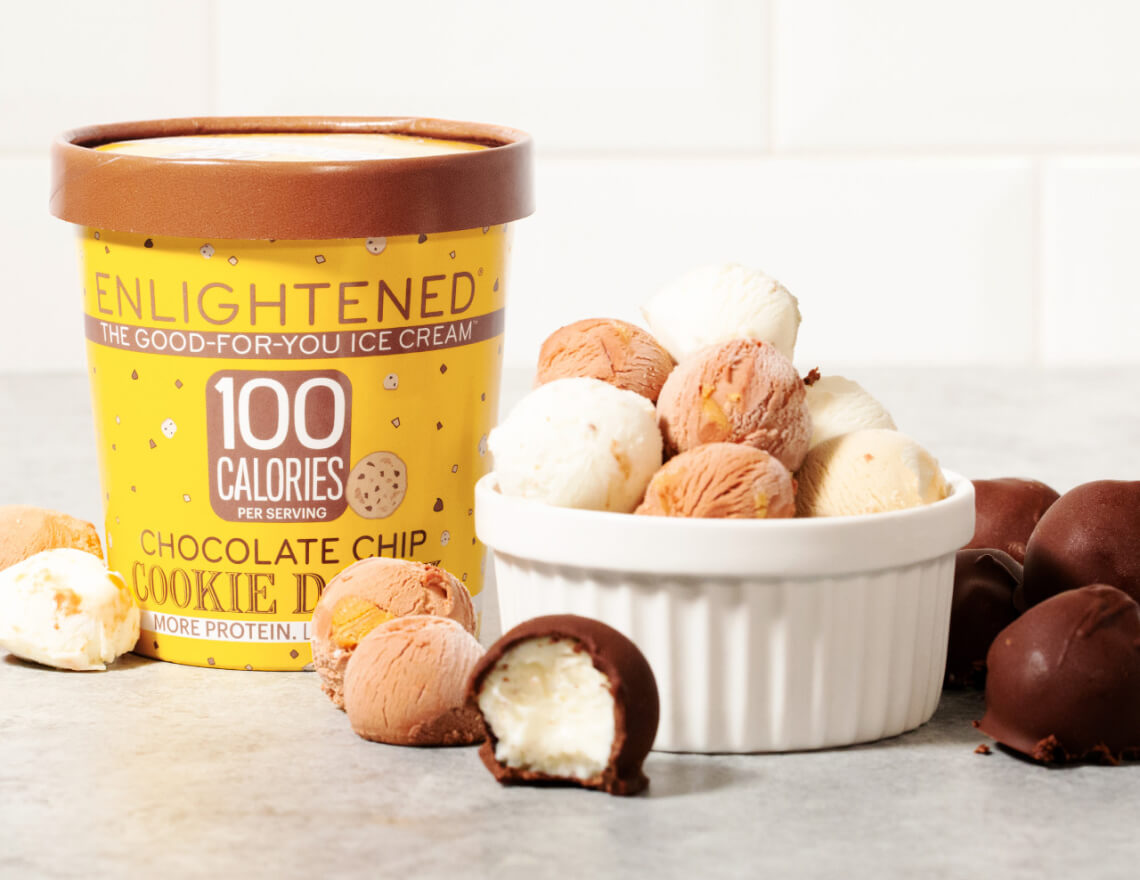 enlightened chocolate chip cookie dough pint beside cup of cookie dough balls