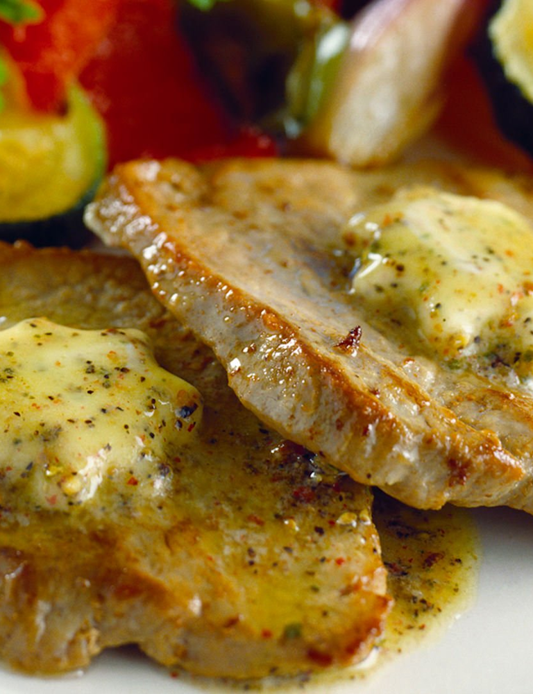 minusl_schweinesteaks_kraeuterbutter_gemuesebeilage.jpg