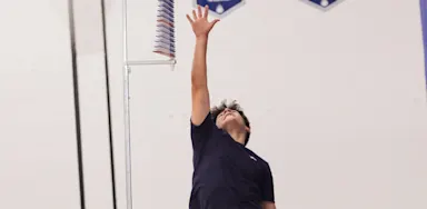 Male practicing vertical jumps