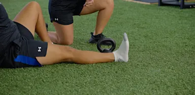 image for Hip Flexor Exercise: Leg Lift Over Kettlebell