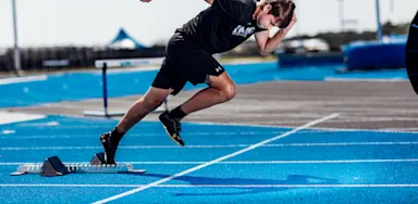 Male sprinter on the track.