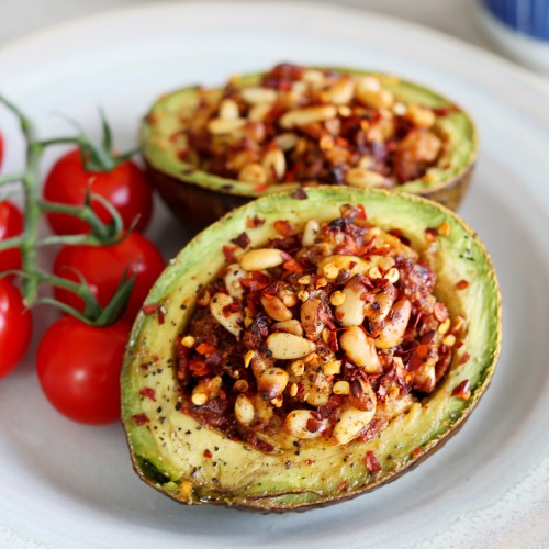 Baked Avocado With Sun-Dried Tomatoes & Pine Nuts