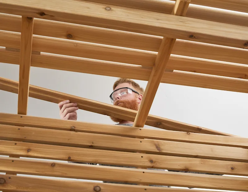 A man building the roof