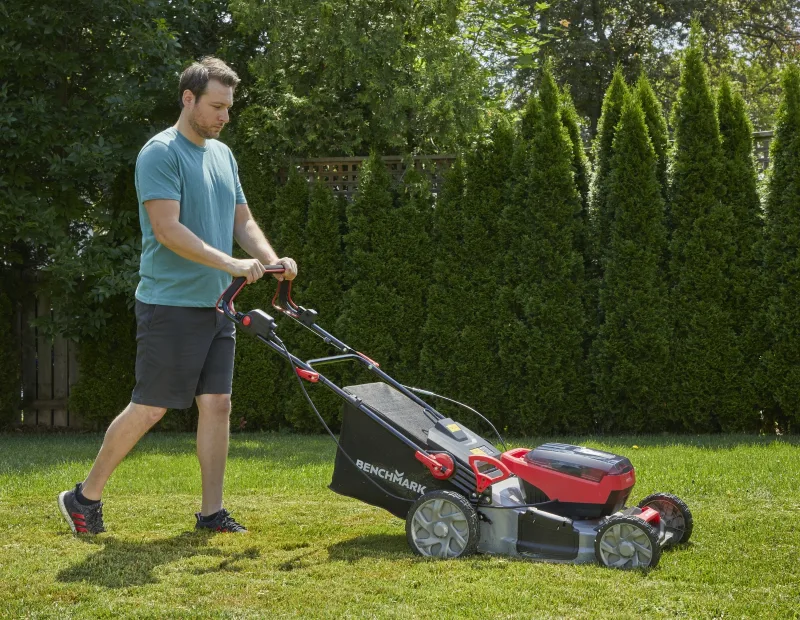 A man mowing the lawn 