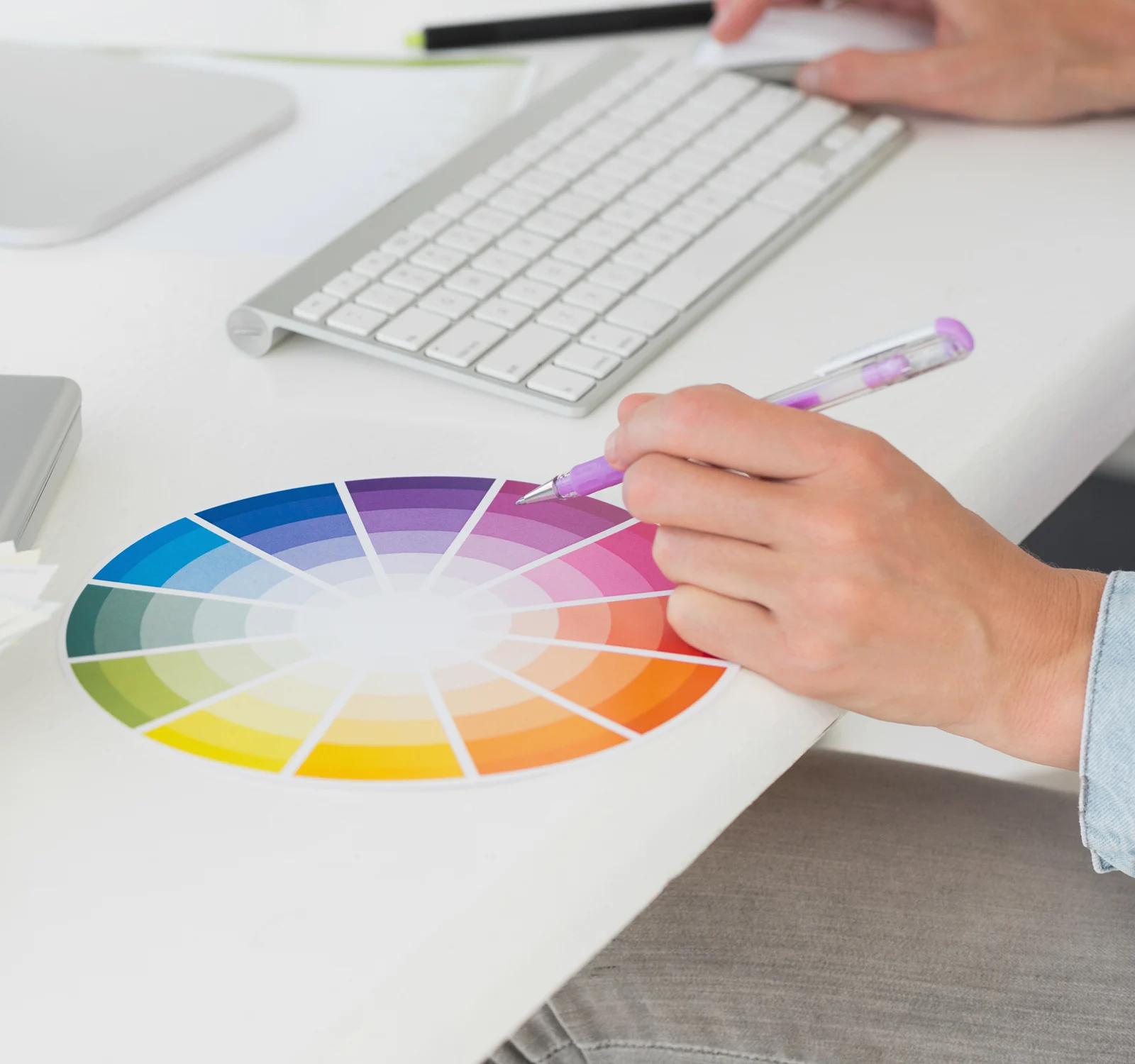 Image of a woman reviewing a colour wheel.