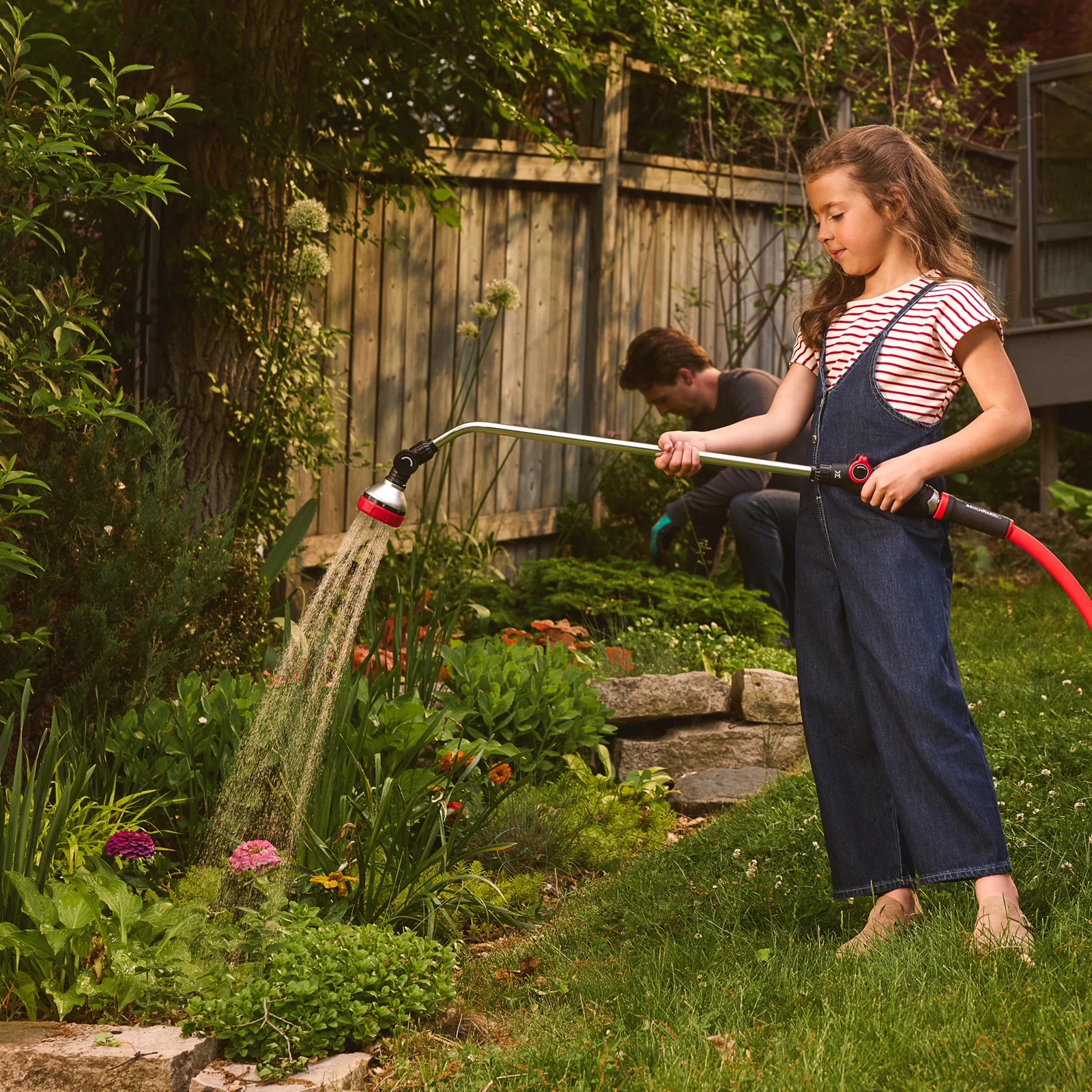 Girl watering garden