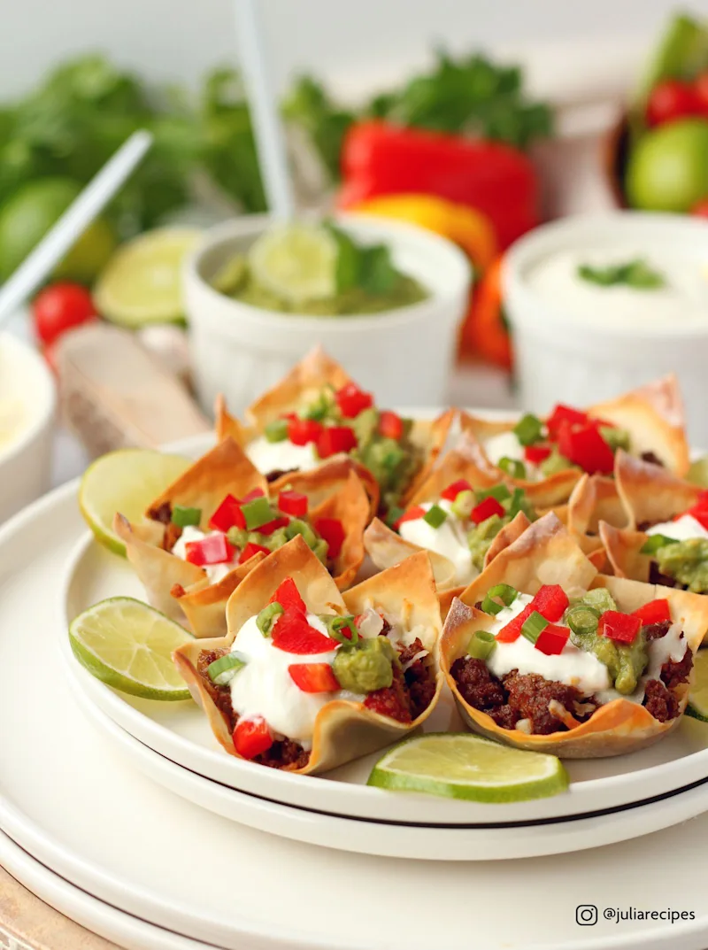 A closeup of mini tacos on a platter