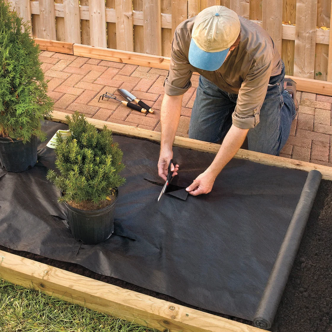 Someone cuts weed barriers