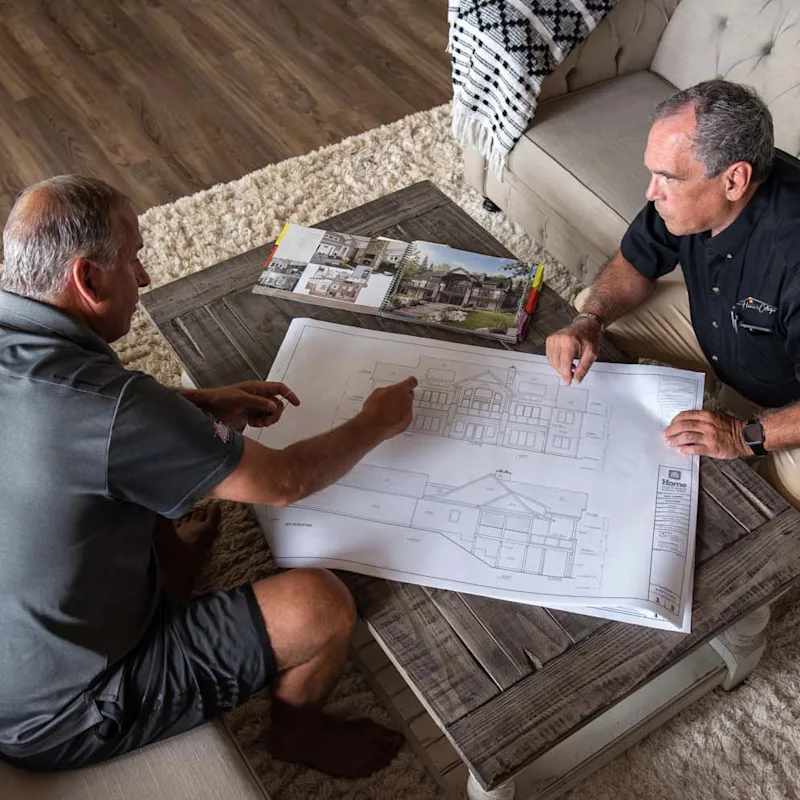 A homeowner discussing with a contactor