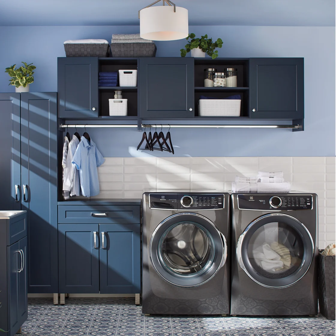 A laundry room with shelving