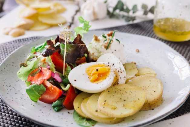 potatoes and egg with salad