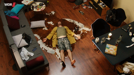 Gif of person drunk on floor