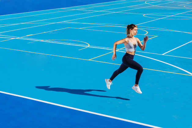 female running outdoors athlete