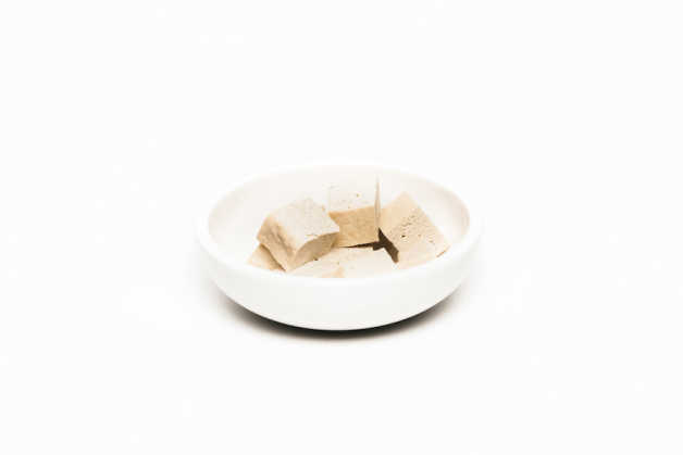 Tofu, raw in white bowl 