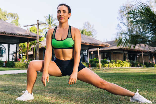stretching outdoors female alba flexibility training