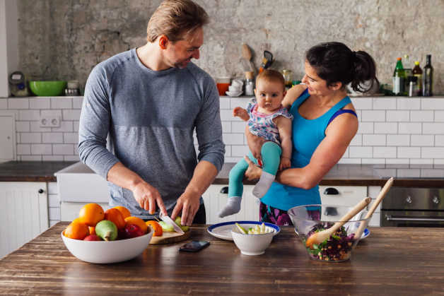 couple and baby in kitchen
