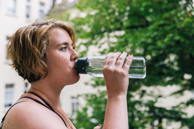 Lifestyle Female Transformation Week Lauren Drinking Water
