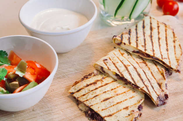 bean quesadilla with spicy salsa and yoghurt