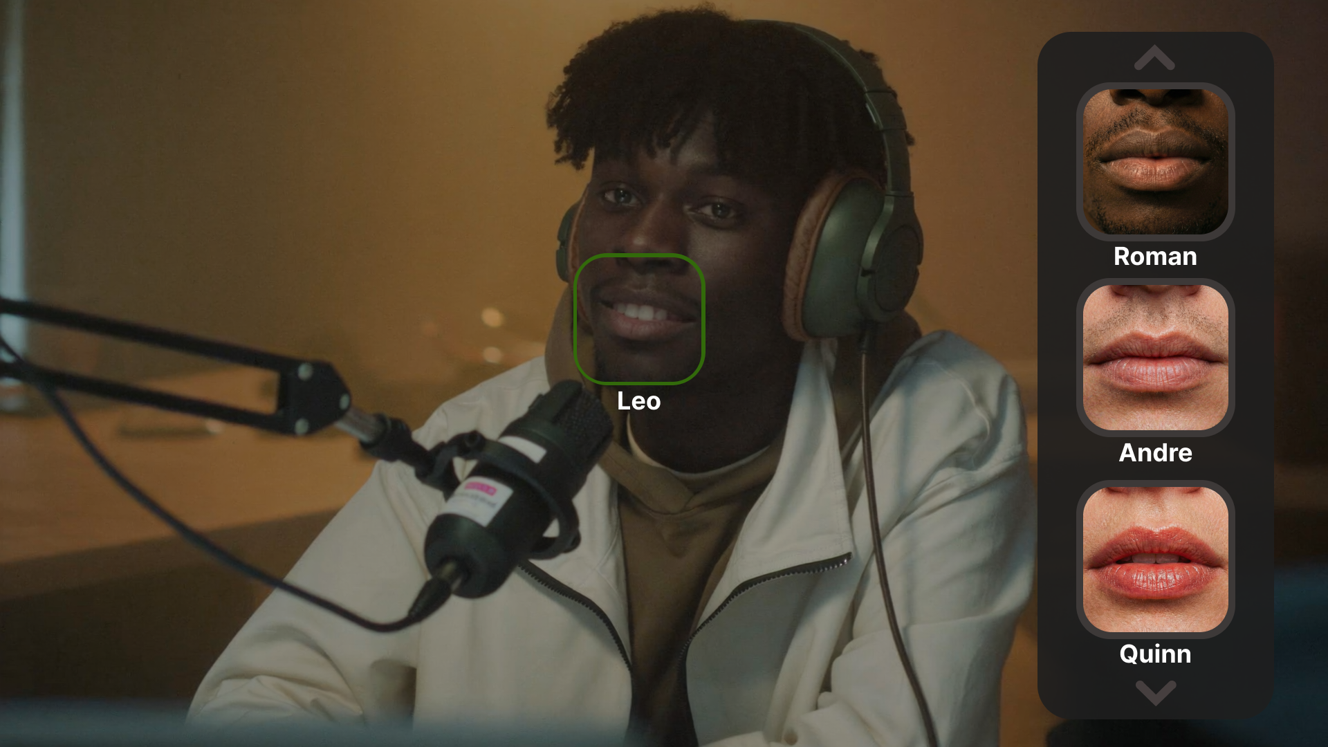 A cinematic, medium shot of a young Black man with curly hair wearing large over-ear headphones and a cream-colored zip-up hoodie. He is sitting in a dimly lit, warm-toned studio recording a podcast, with a professional XLR microphone on a boom arm in the foreground. Overlaid on the right side of the frame is a sleek, dark translucent mobile UI vertical menu featuring three close-up thumbnail options of different people's lips (labeled