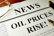 Newspaper with header news and Oil prices rise