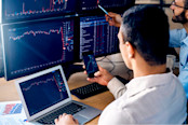traders monitoring stocks data