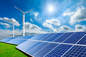 Solar panels with wind turbines on a sunny day