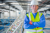 Worker In Waste Recycling Plant