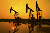 Oil Pump on orange sunset