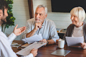 Senior couple meeting with financial advisor