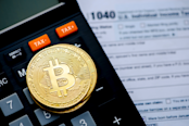 cryptocurrency concept with US tax form 1040