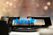 Gas cooker with burning flames of propane gas